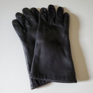 Elegant black leather driving gloves